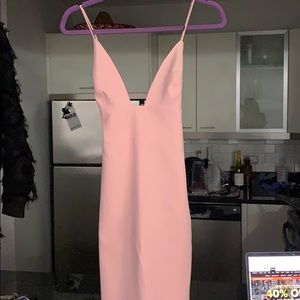 Strapped dress with gold zipper in the back